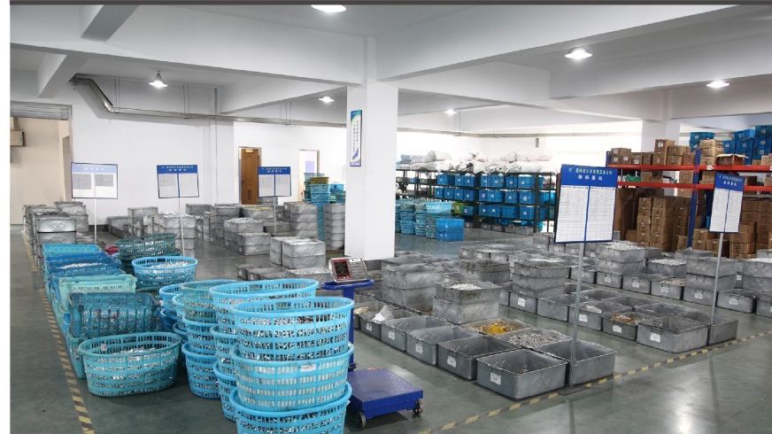 Packing area with cartons and packed hardware