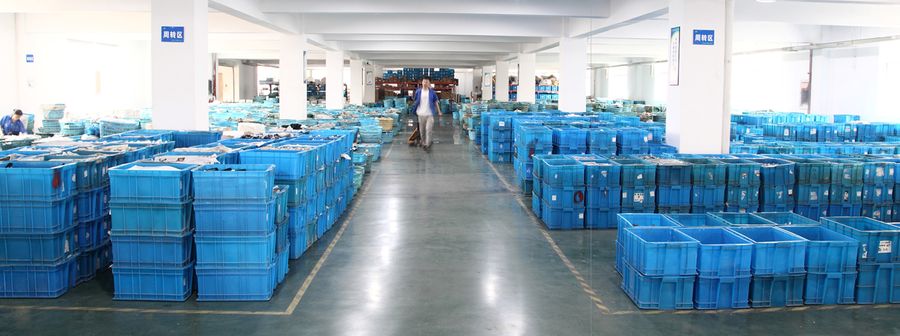 Finished goods warehouse with packed cartons on racks